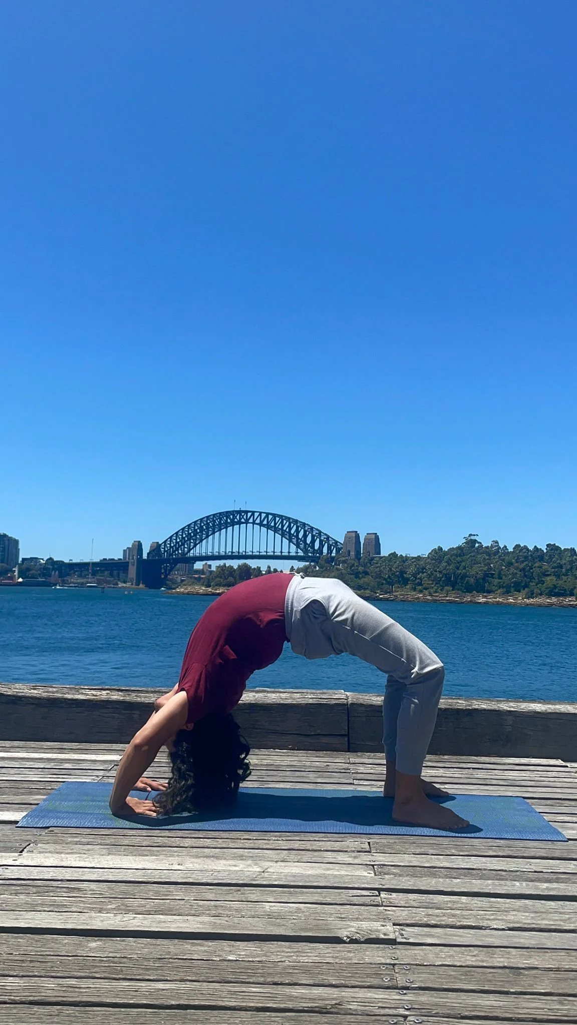 Sudesh guiding a yoga and breathwork practice
